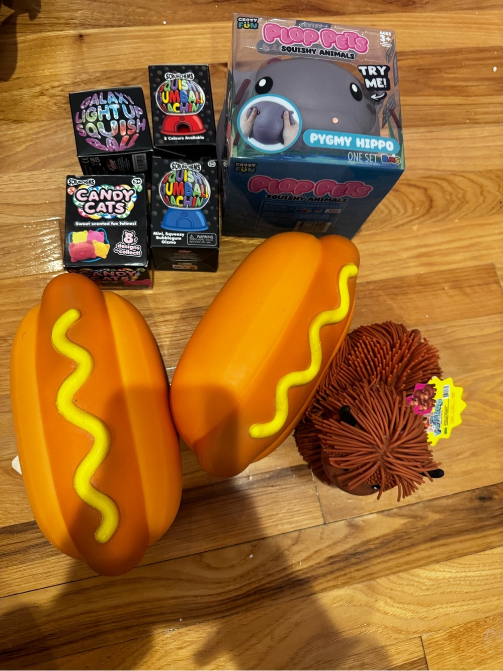 Squishy Toy Lot with Hot Dog Squeezies & Pygmy Hippo Plush